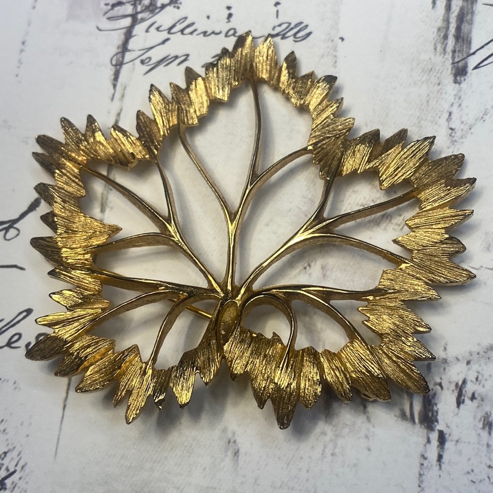 Vintage Napier goldtone maple leaf